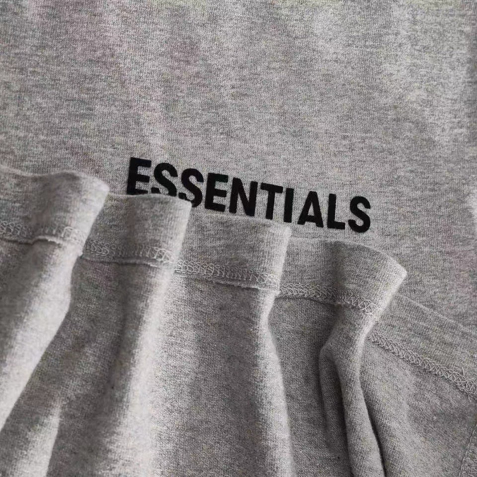 Camiseta gris claro, gris oscuro y negra