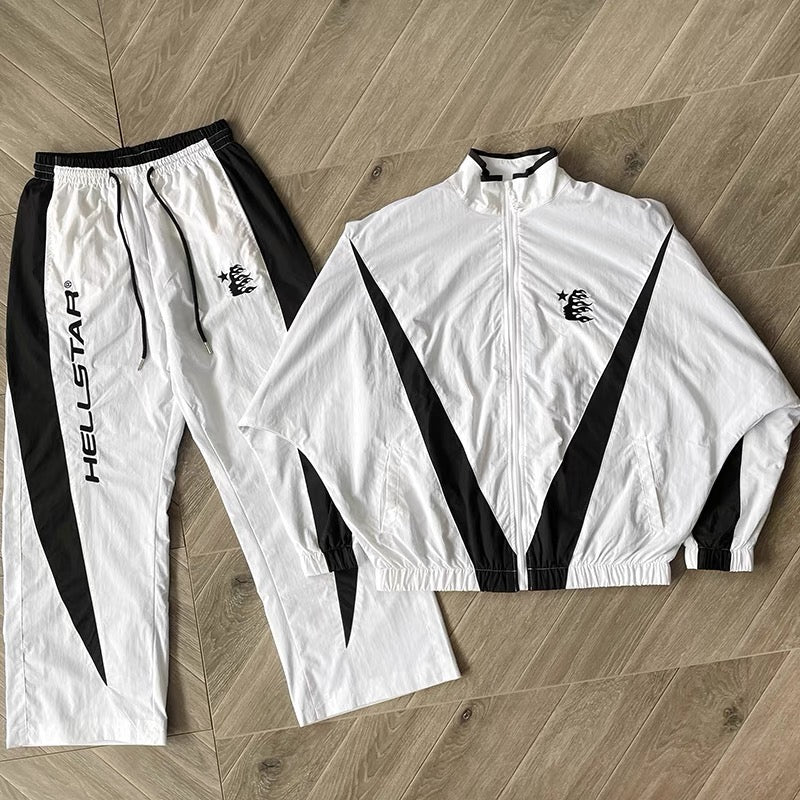 Weiß-schwarzes Trikot mit Hose