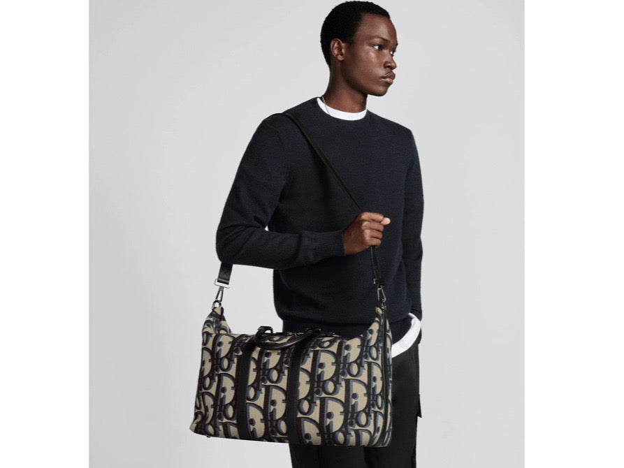 Blaue und schwarzgraue Tasche