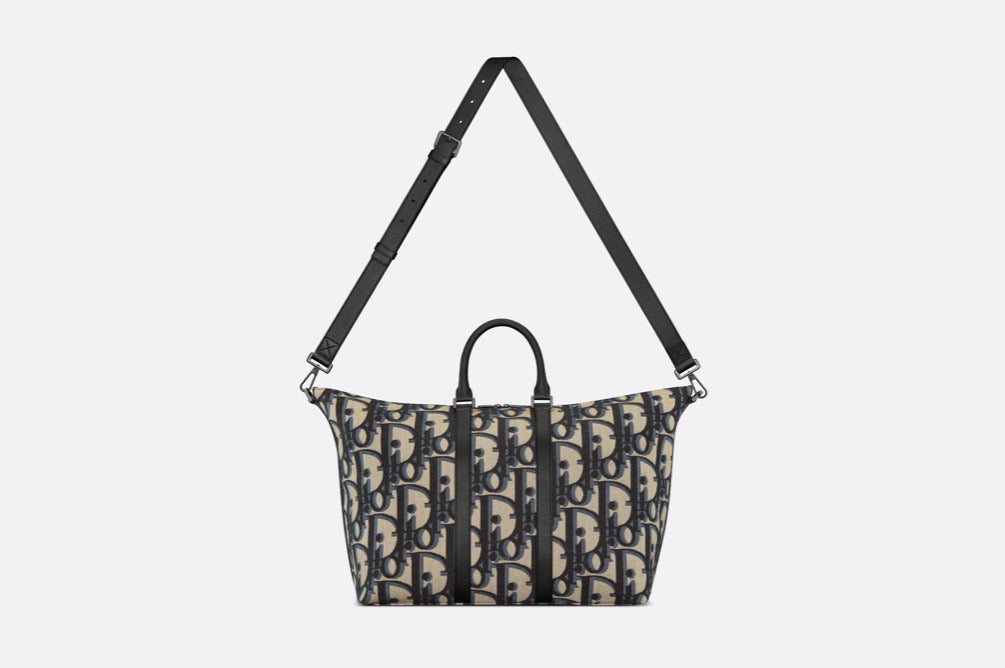 Blaue und schwarzgraue Tasche