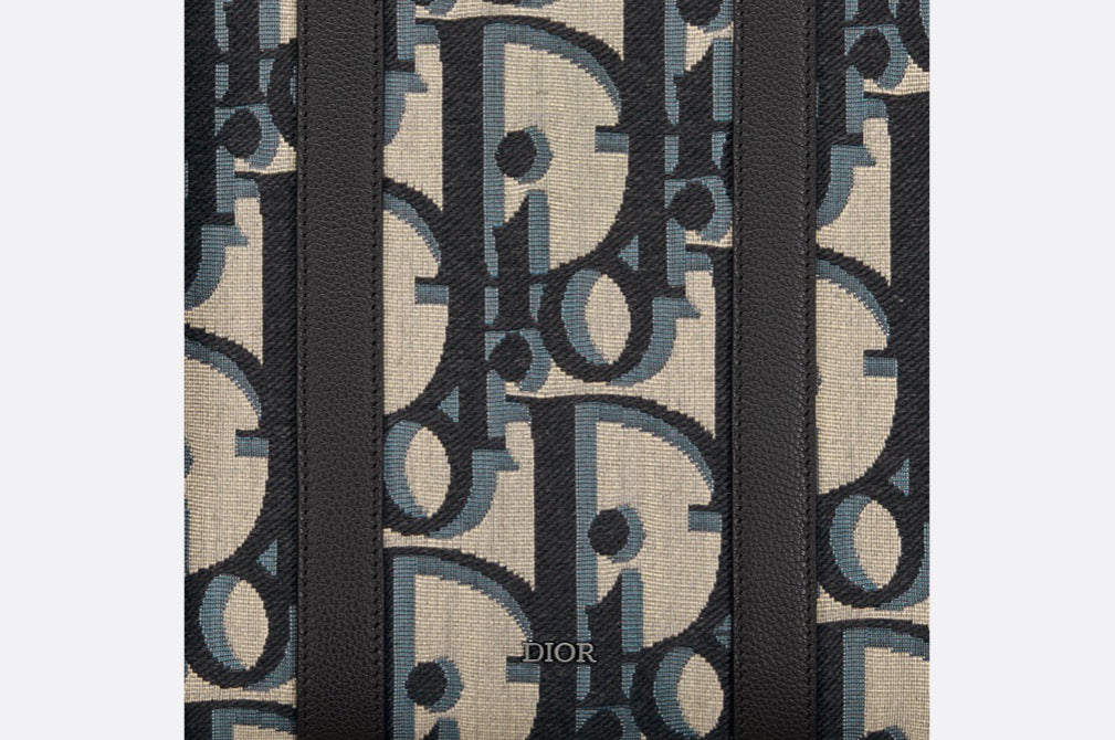 Blaue und schwarzgraue Tasche