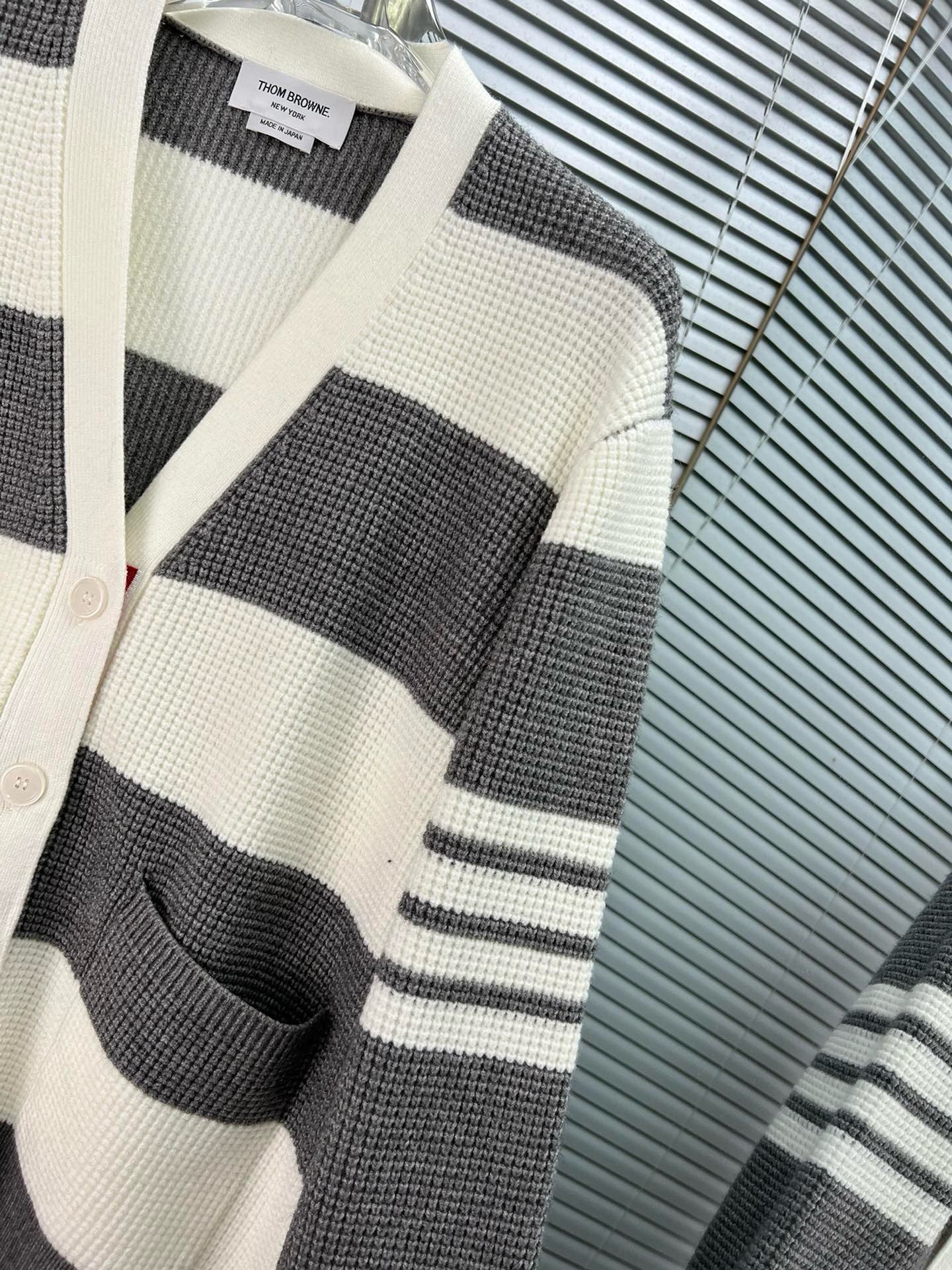 Grauweiße Jacke