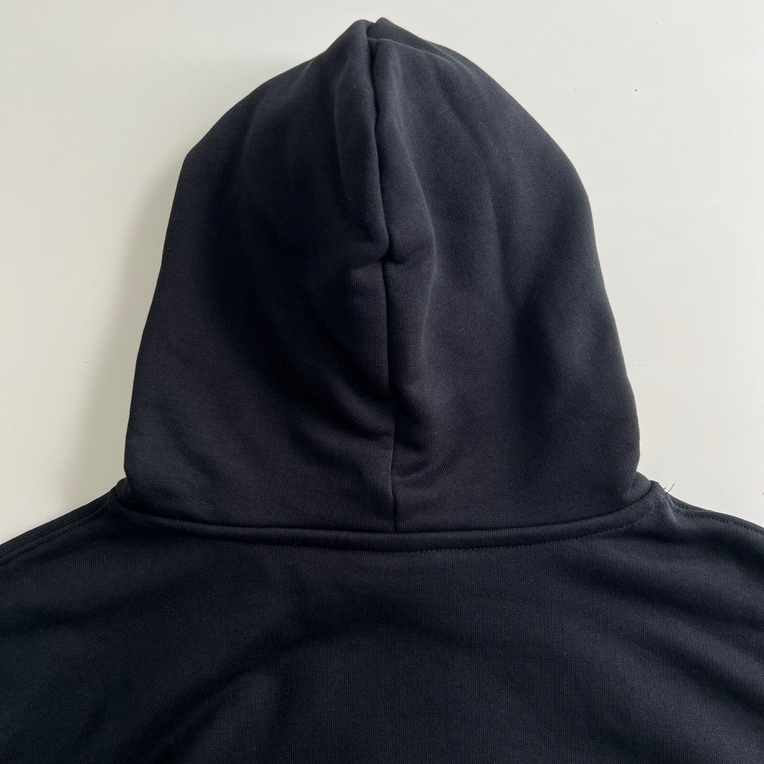 Sudadera con capucha en blanco y negro