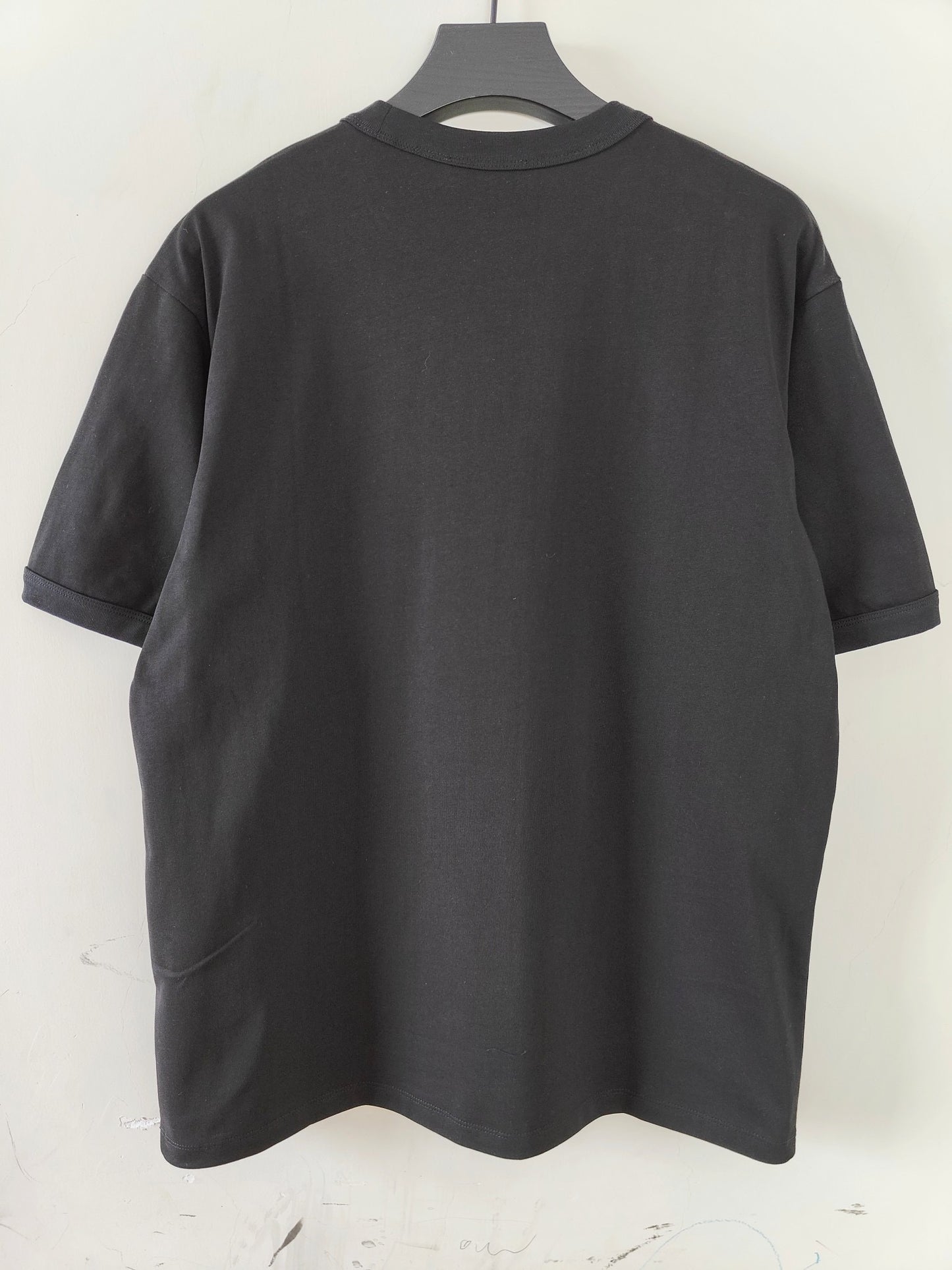 Schwarz-weiße T-Shirts