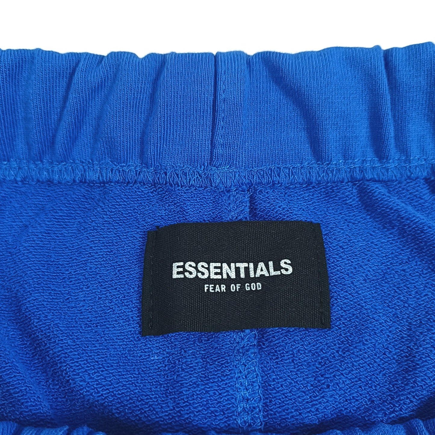 Pantalones cortos blancos y azules