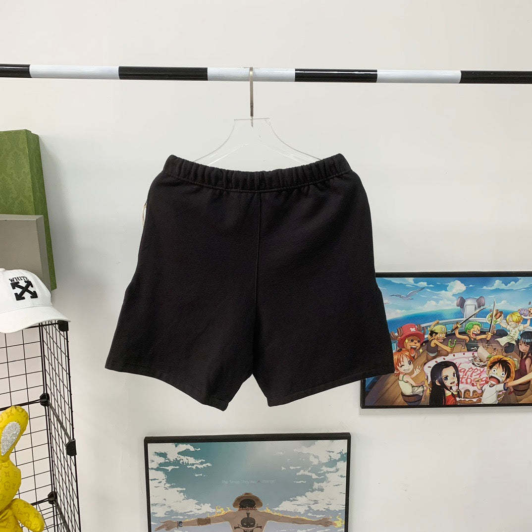 Pantalones cortos grises y negros