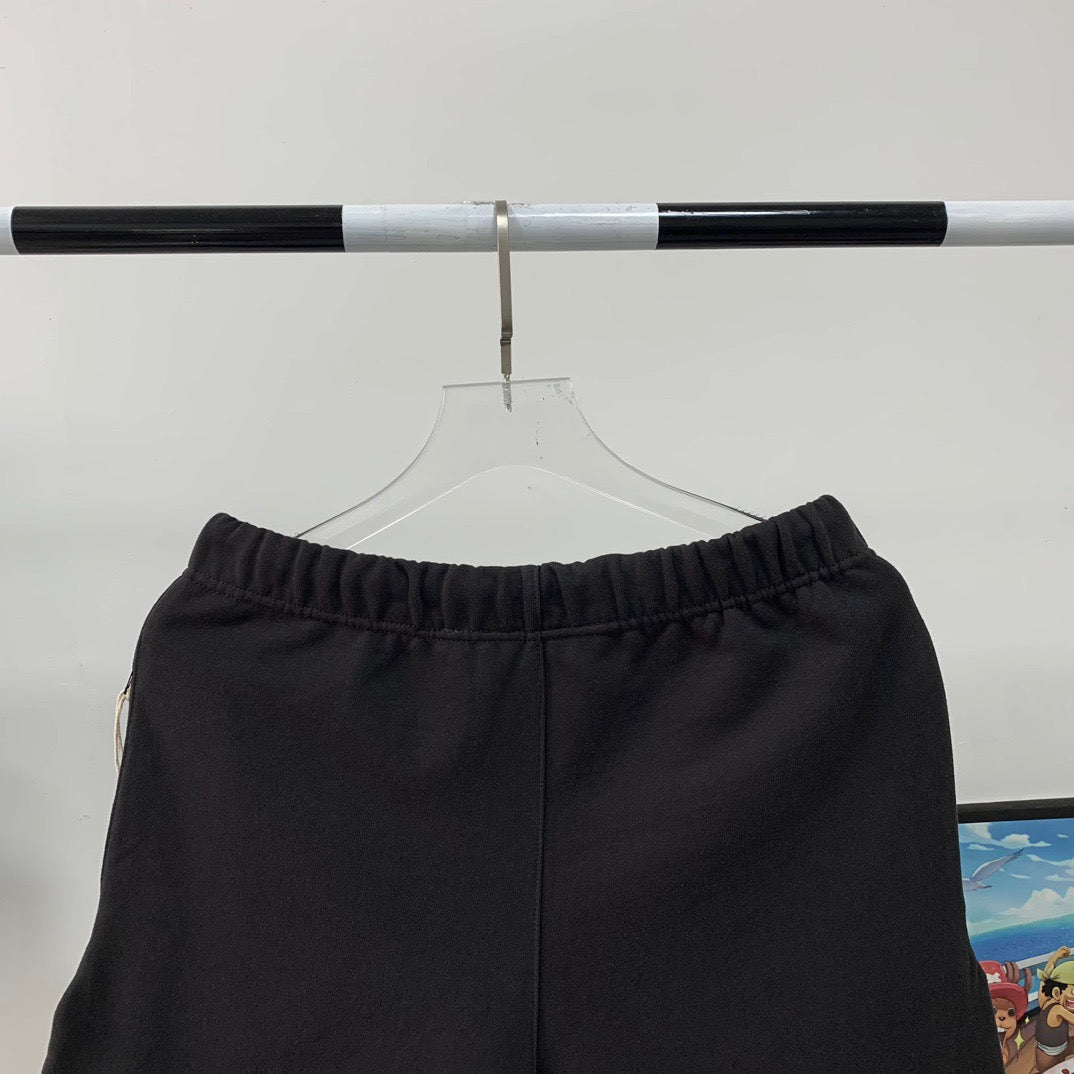 Pantalones cortos grises y negros