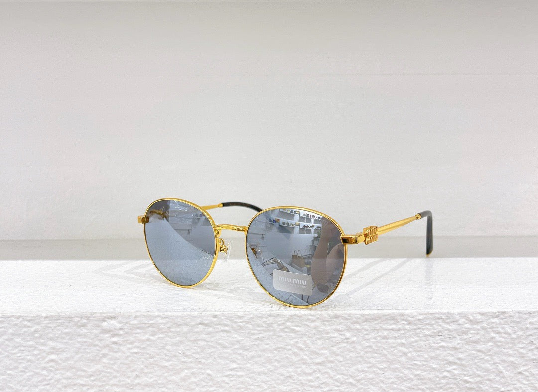 Gafas de sol verdes, negras y marrones