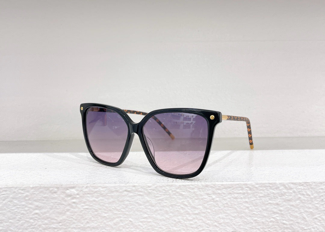 Gafas de sol negras, marrones y blancas