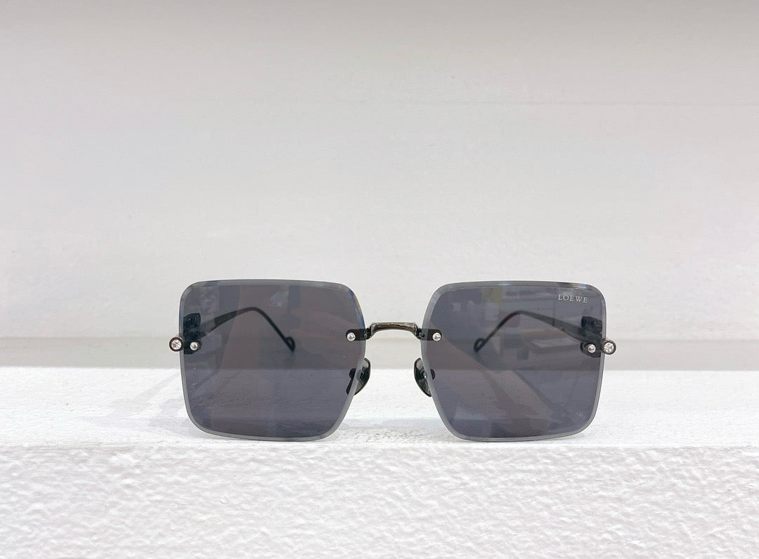 Gafas de sol azules, marrones, negras y rosas