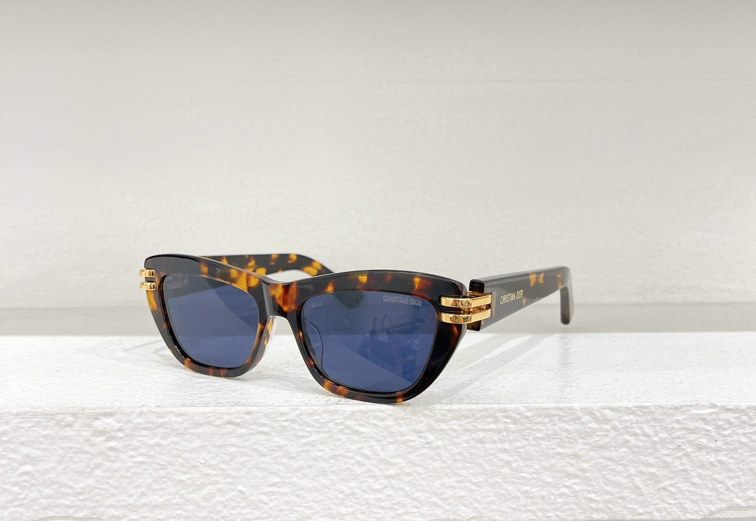 Weiße, braune, schwarze und blaue Sonnenbrille