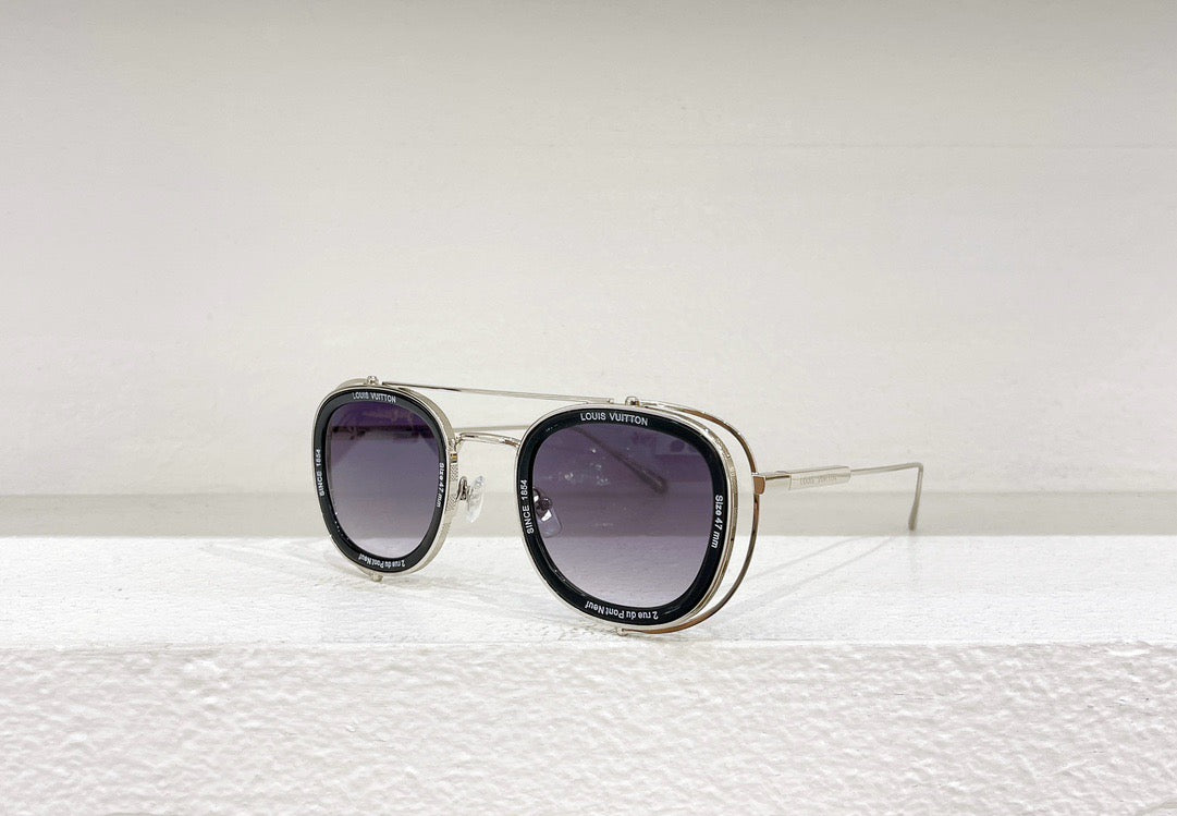 Gafas de sol negras, blancas y marrones