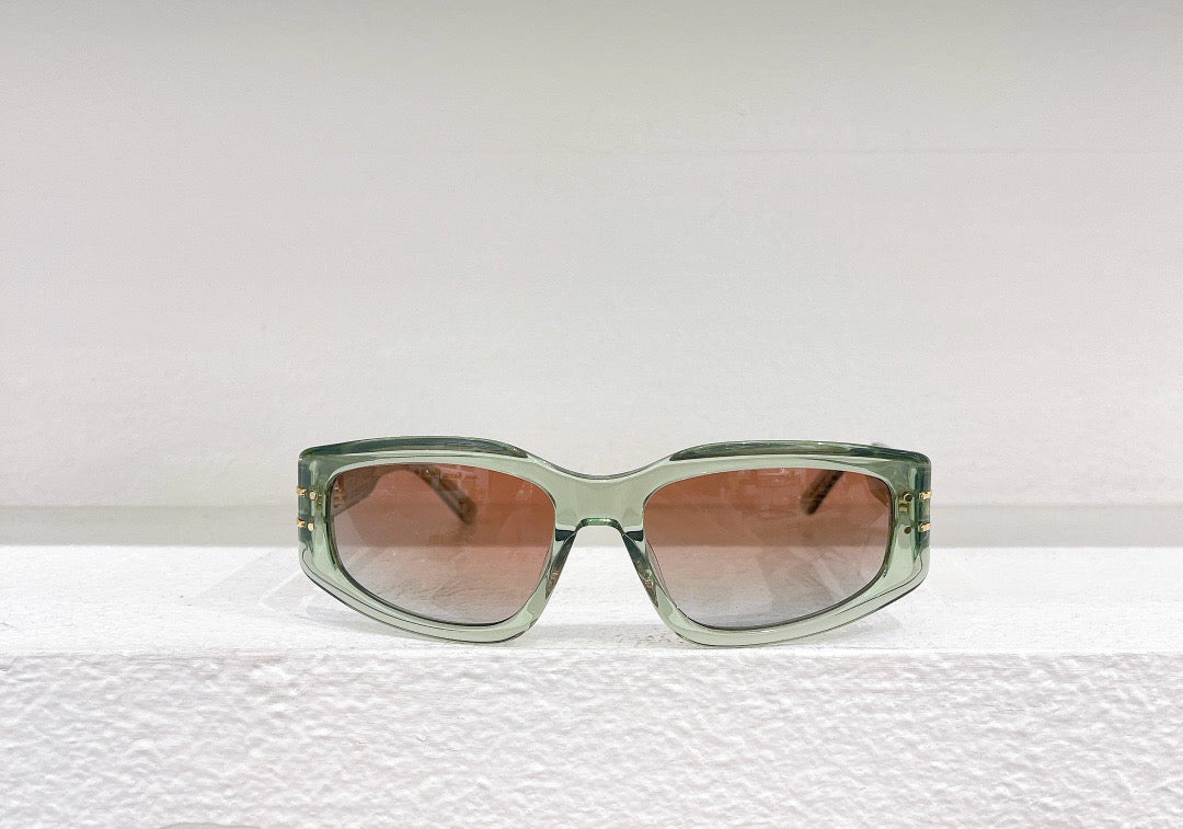 Gafas de sol negras, verdes y marrones