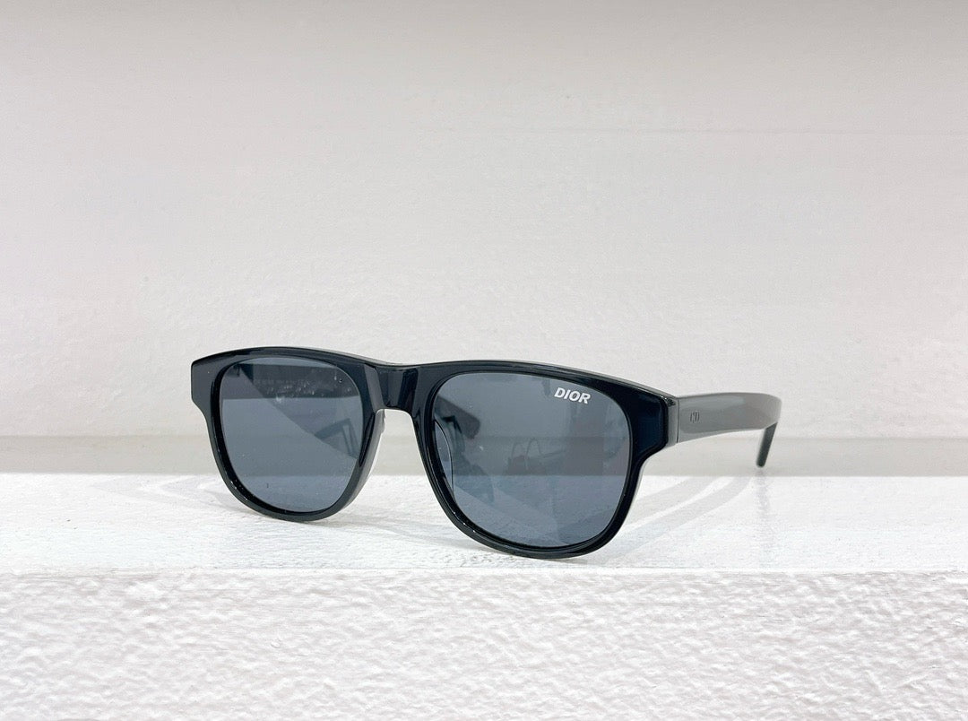 Schwarze, weiße und braune Sonnenbrille