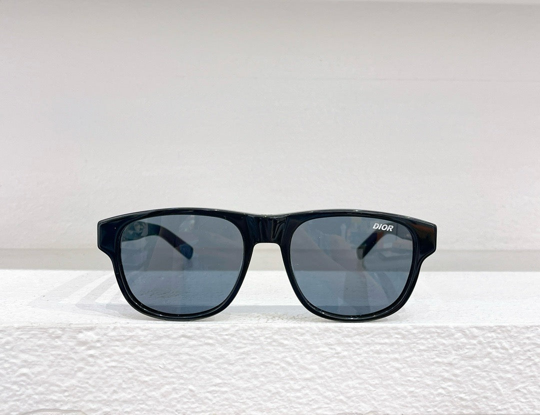 Schwarze, weiße und braune Sonnenbrille