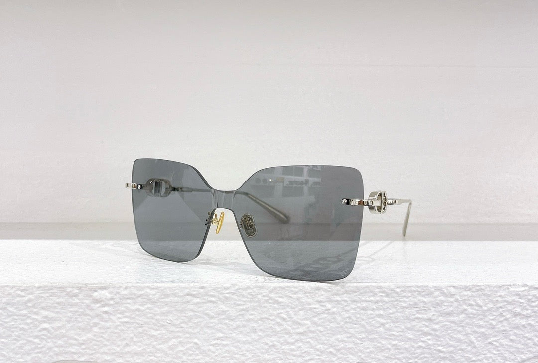Blaue, braune, schwarze und rosa Sonnenbrille