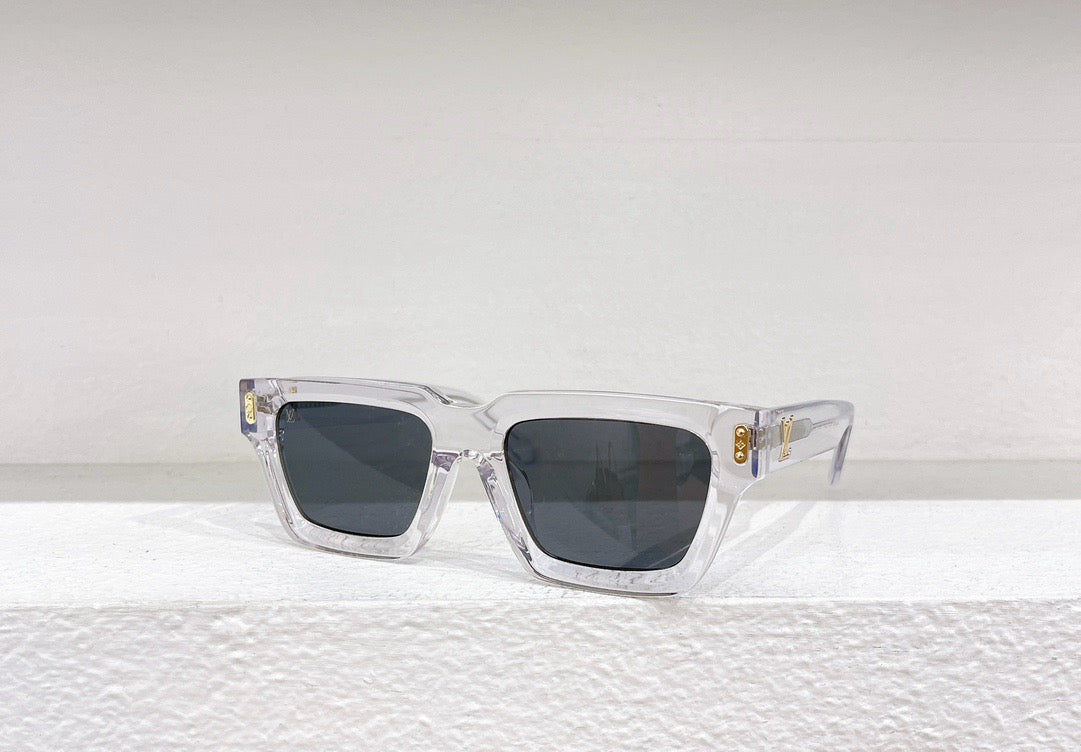 Gafas de sol negras, marrones y blancas