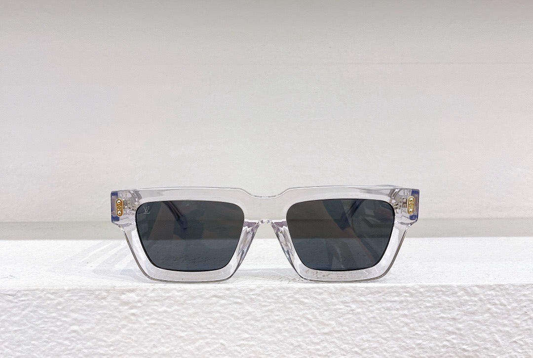 Gafas de sol negras, marrones y blancas