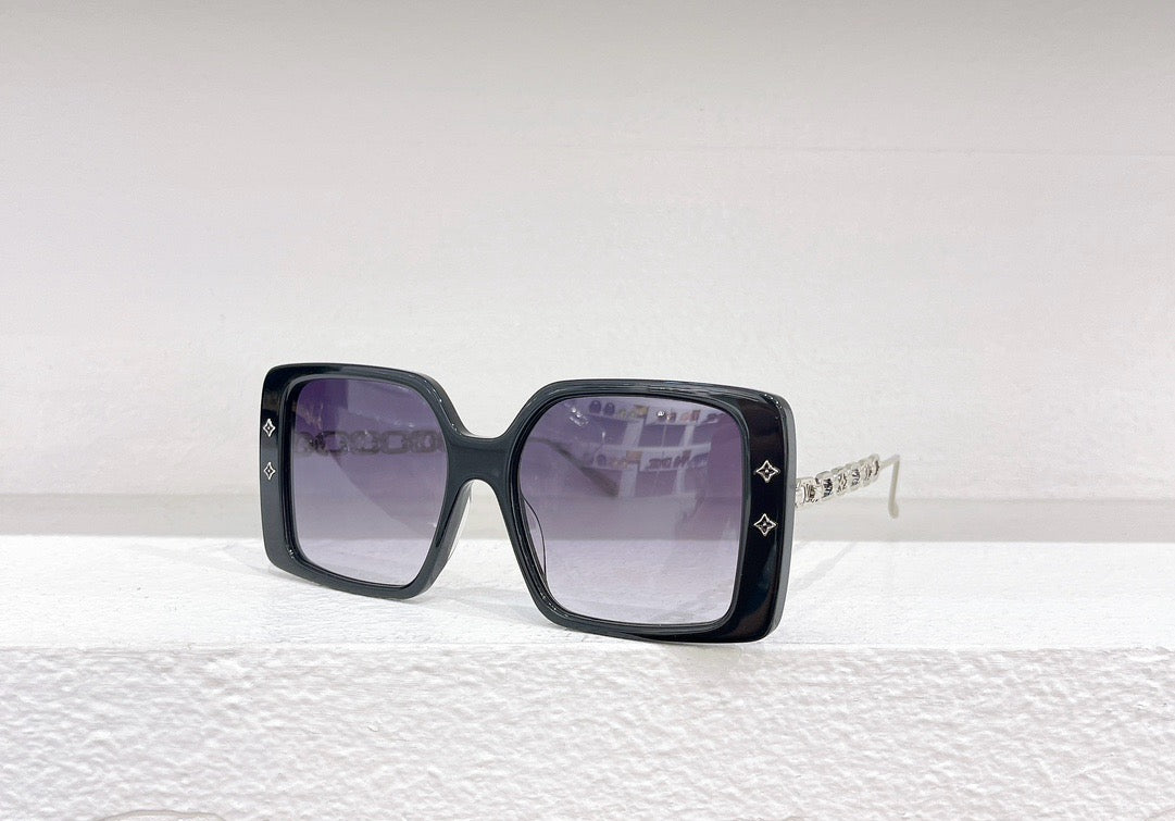 Gafas de sol negras, blancas, marrones y rosas