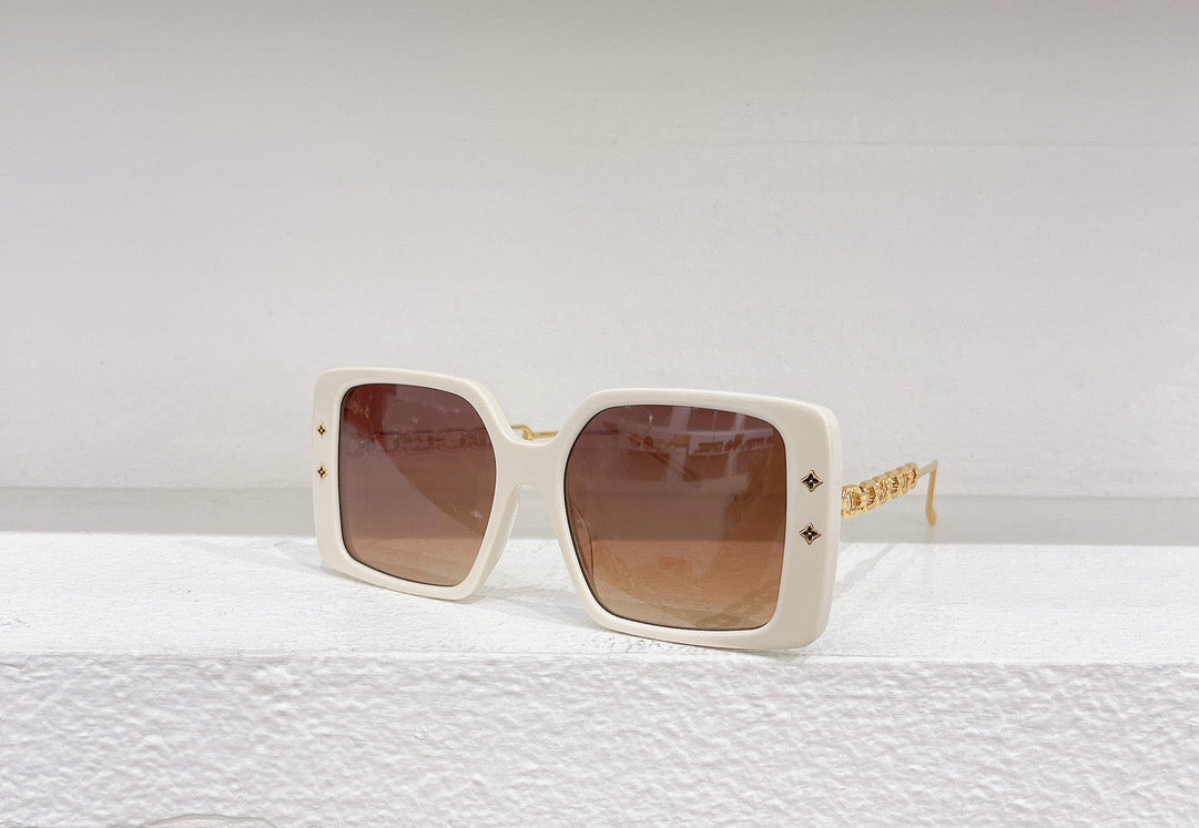 Gafas de sol negras, blancas, marrones y rosas