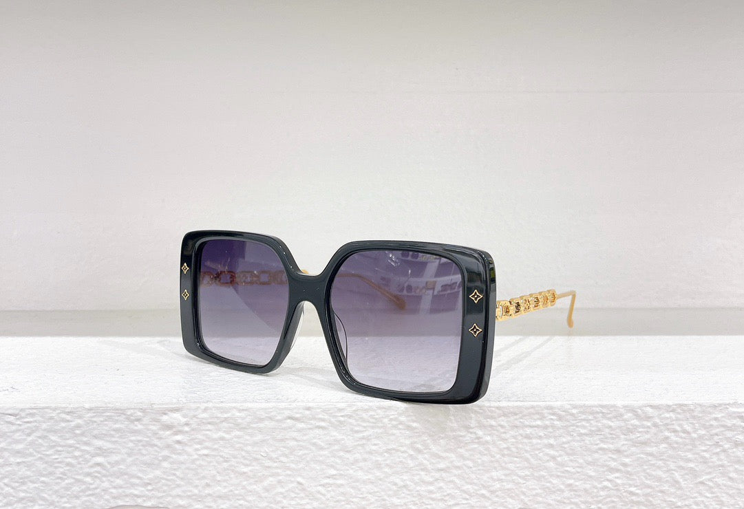 Gafas de sol negras, blancas, marrones y rosas