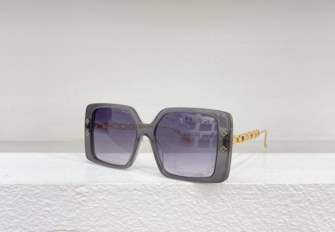 Gafas de sol negras, blancas, marrones y rosas