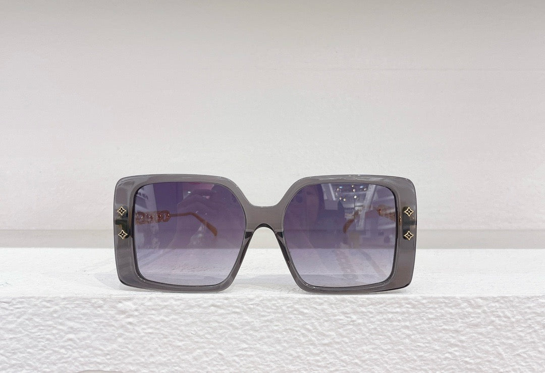Gafas de sol negras, blancas, marrones y rosas