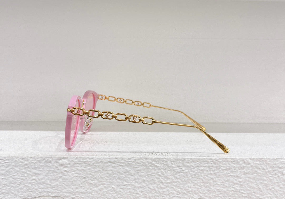 Gafas de sol negras, marrones, blancas y rosas
