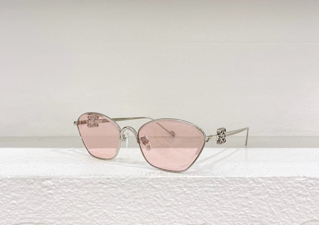 Gafas de sol marrones, amarillas, rosas y negras