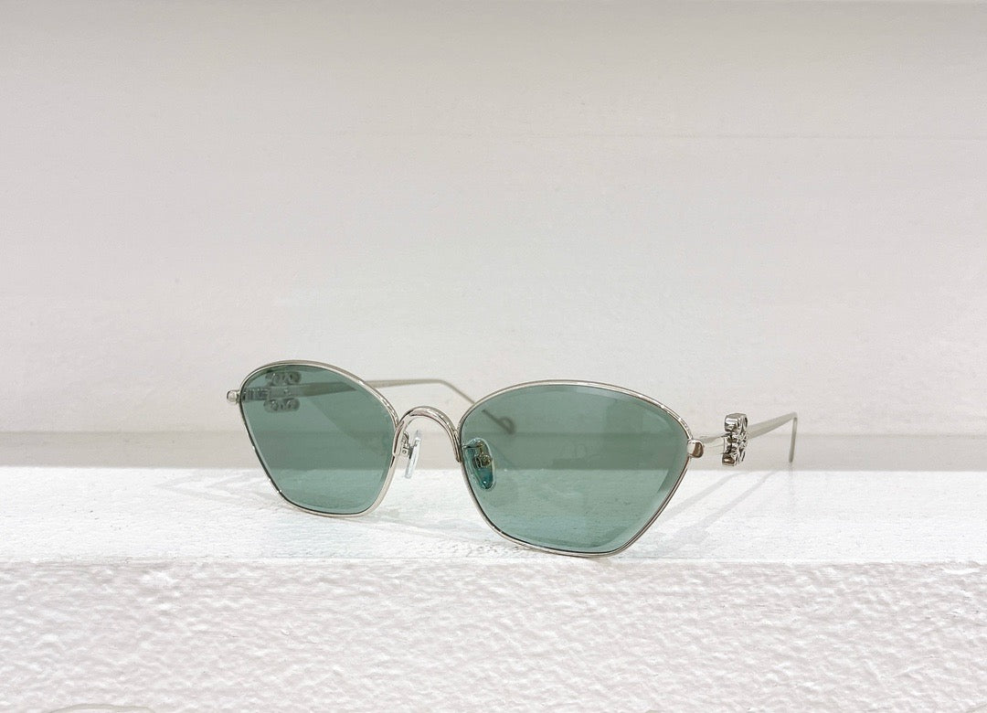 Gafas de sol marrones, amarillas, rosas y negras