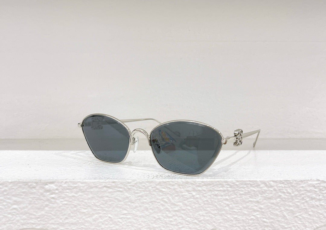 Gafas de sol marrones, amarillas, rosas y negras