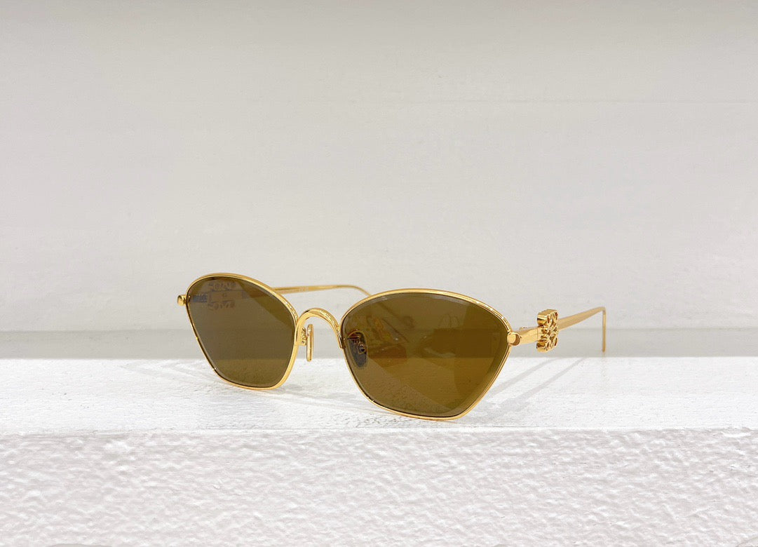 Gafas de sol marrones, amarillas, rosas y negras
