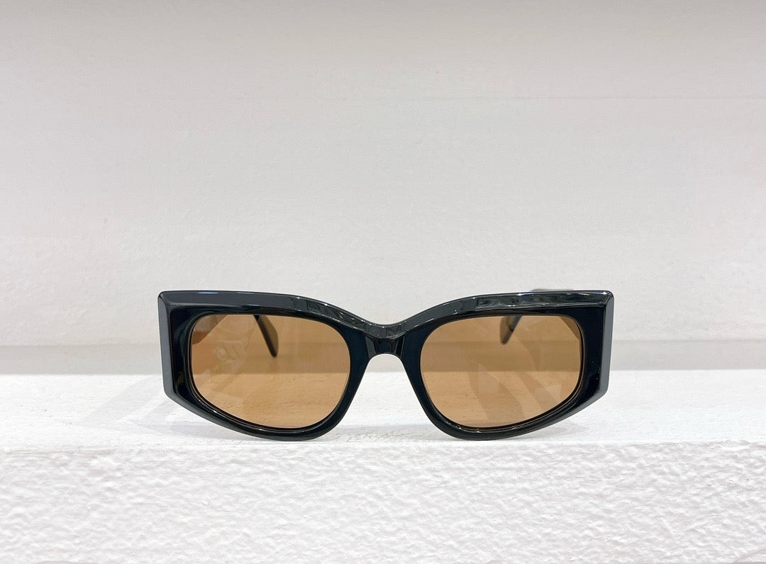 Gafas de sol negras, rojas y blancas