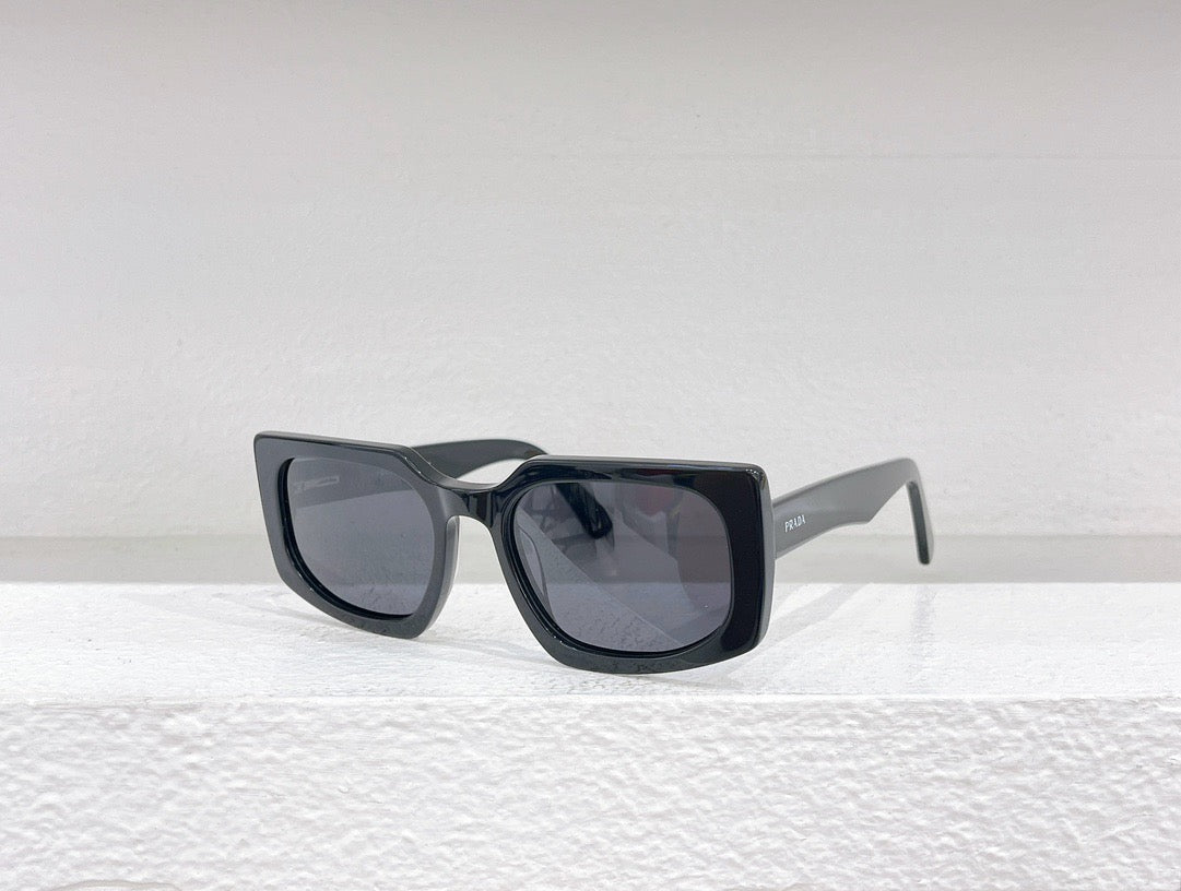 Gafas de sol negras, azules, marrones y grises