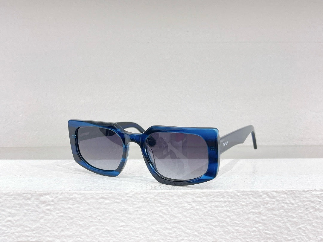 Gafas de sol negras, azules, marrones y grises