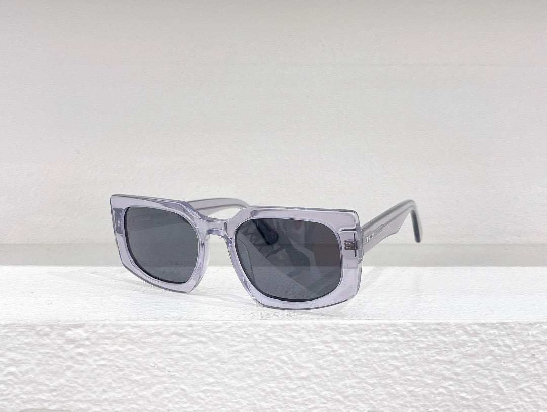 Gafas de sol negras, azules, marrones y grises