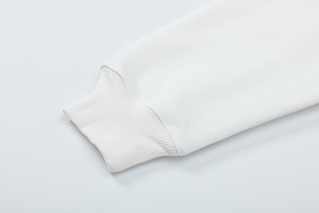 Schwarz-weißer Kapuzenpullover