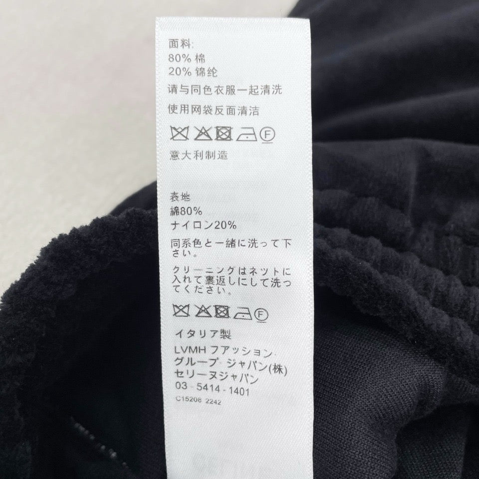 Pantalón negro y verde