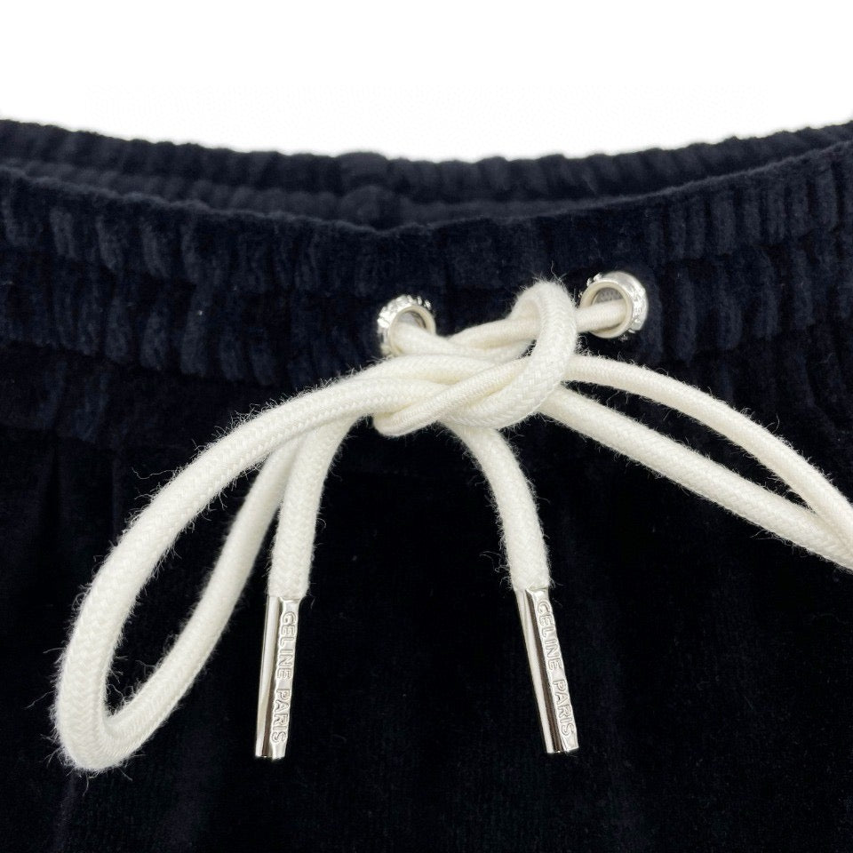 Pantalón negro y verde