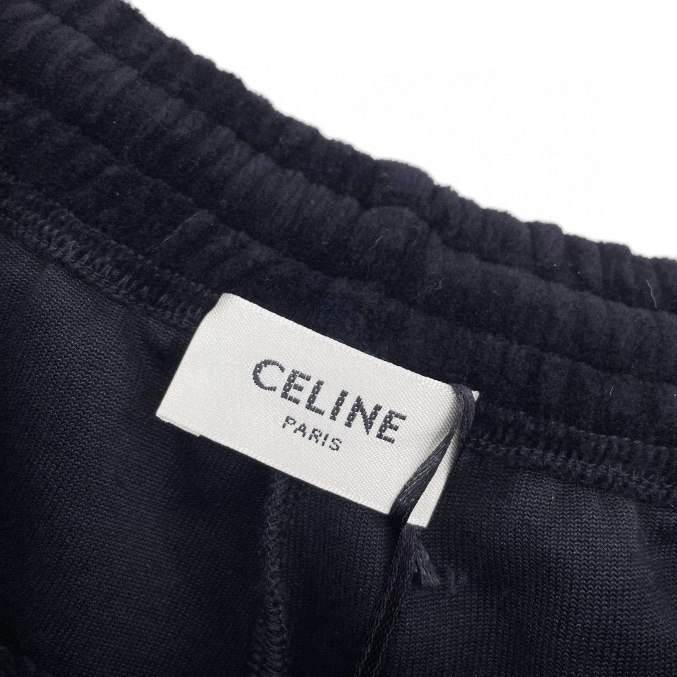 Pantalón negro y verde