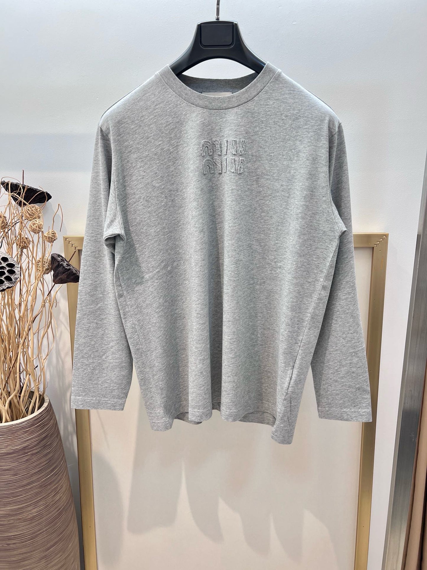 Jersey gris, blanco y negro