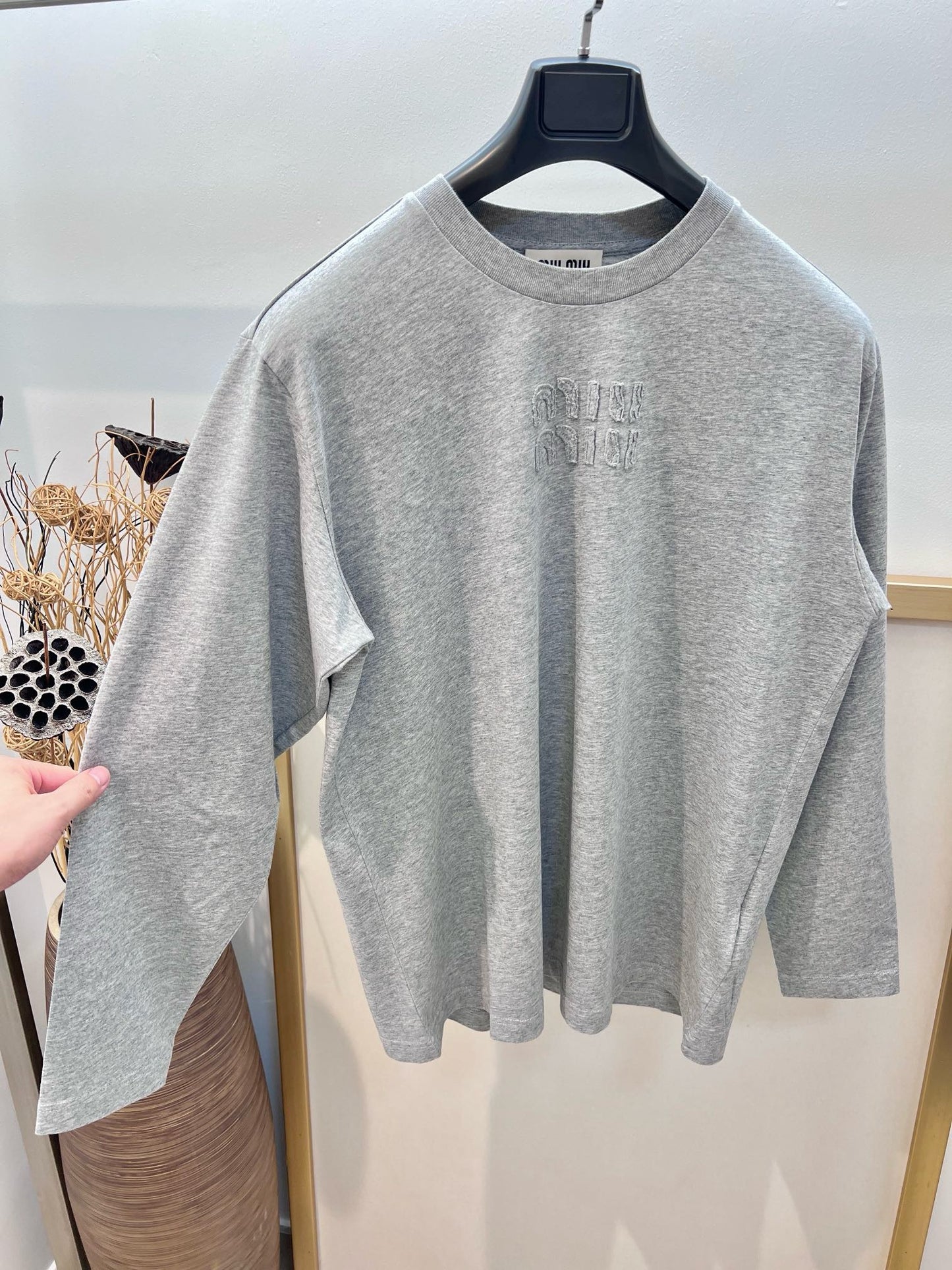 Jersey gris, blanco y negro