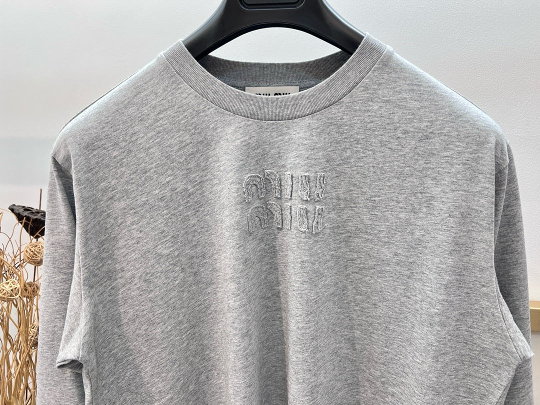Jersey gris, blanco y negro