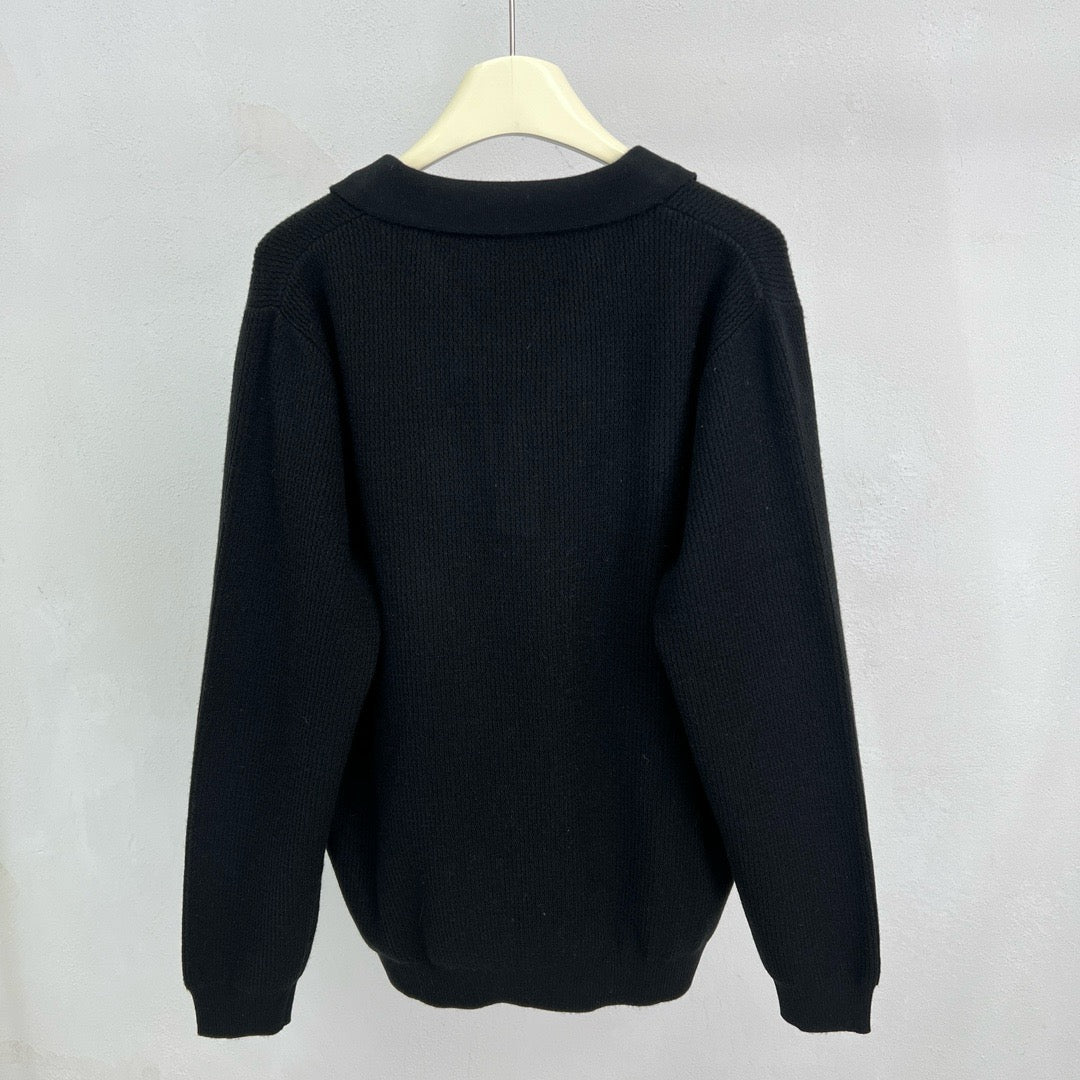 Jersey negro, gris y beige