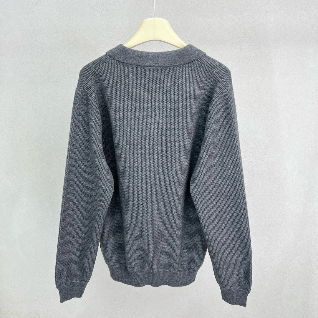 Jersey negro, gris y beige