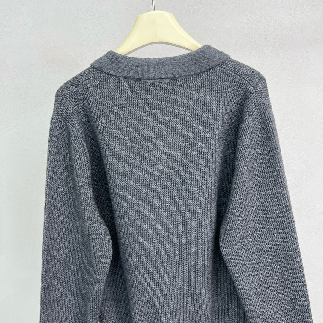Jersey negro, gris y beige