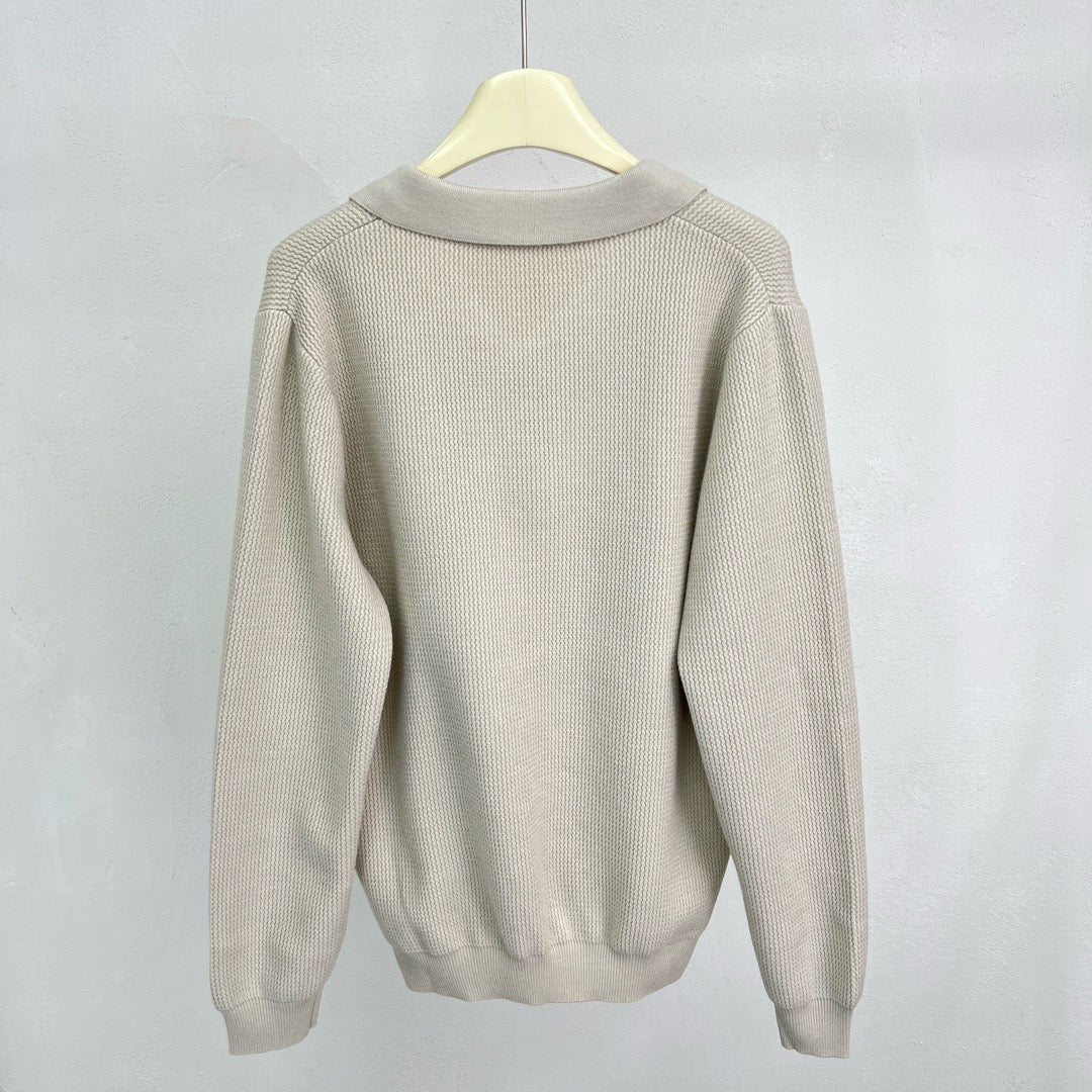 Jersey negro, gris y beige