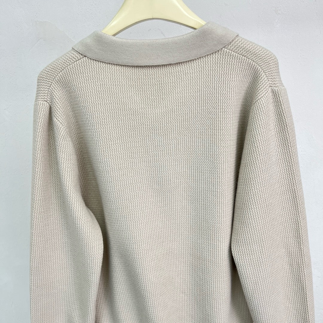 Jersey negro, gris y beige