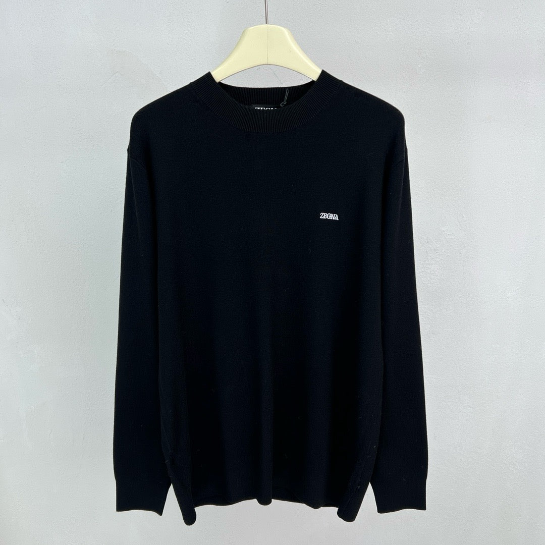 Jersey negro, gris y blanco
