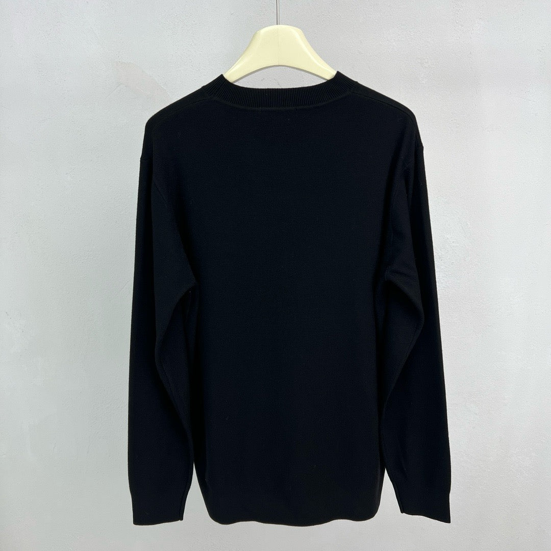 Jersey negro, gris y blanco